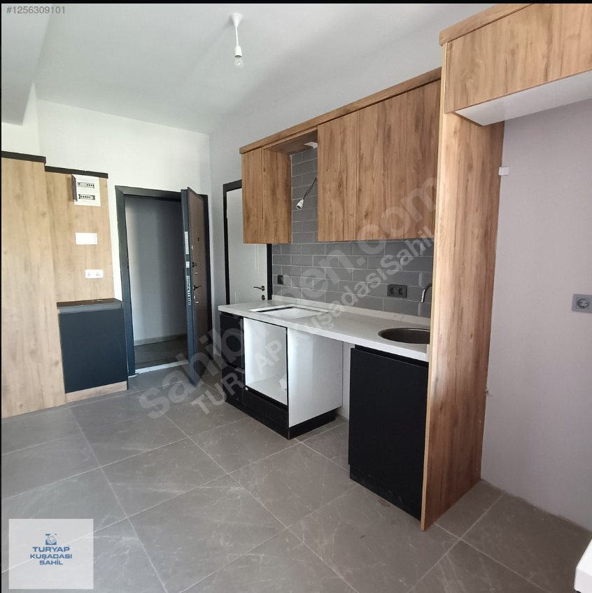 Kuşadası Davutlarda merkezi konumda kiralık 1+1 daire